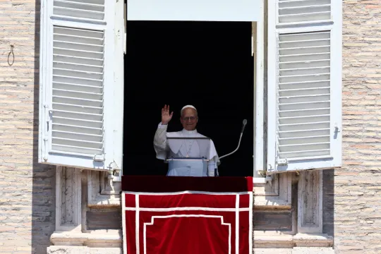 Pope Leo XIV leads the Regina Caeli prayer from his window in St. Peter's Square