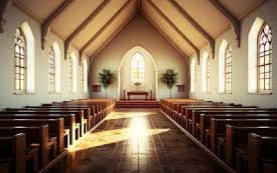 church inside with light shining through windows